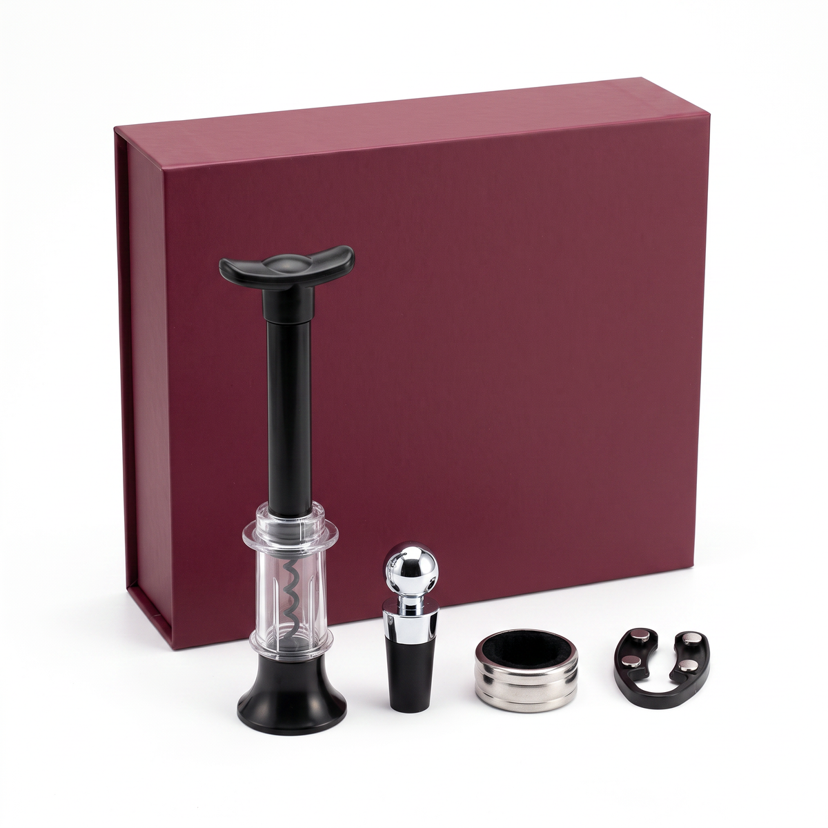 Coffret cadeau tire-bouchon à air avec accessoires et boîte bordeaux sur fond blanc